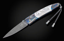  London Blue topaz and a hand-forged damascus steel blade by Chad Nichols
