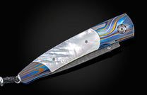 Exclusive edition knife from William Henry with a 'Laser Blue' finished frame in aerospace grade titanium