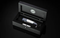  London Blue topaz and a hand-forged damascus steel blade by Chad Nichols