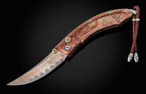 The Persian 'Range Fire' pocket knife from William Henry features a beautiful frame in 'Wave' Mokume Gane