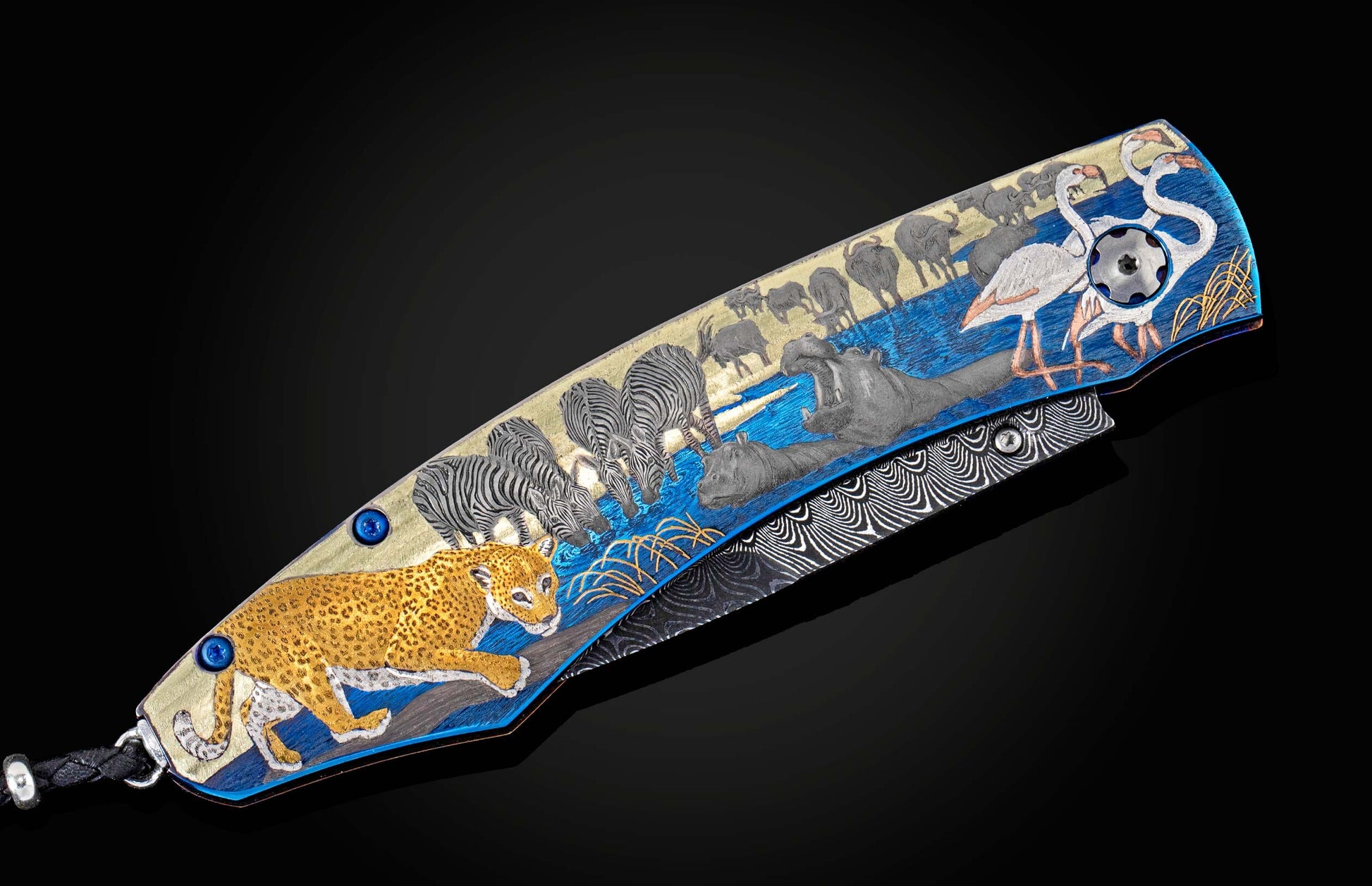 Handcrafted William Henry knife with anodized and hand-engraved titanium frame with gold and fine silver inlays featuring African wildlife by Matyas Balazs