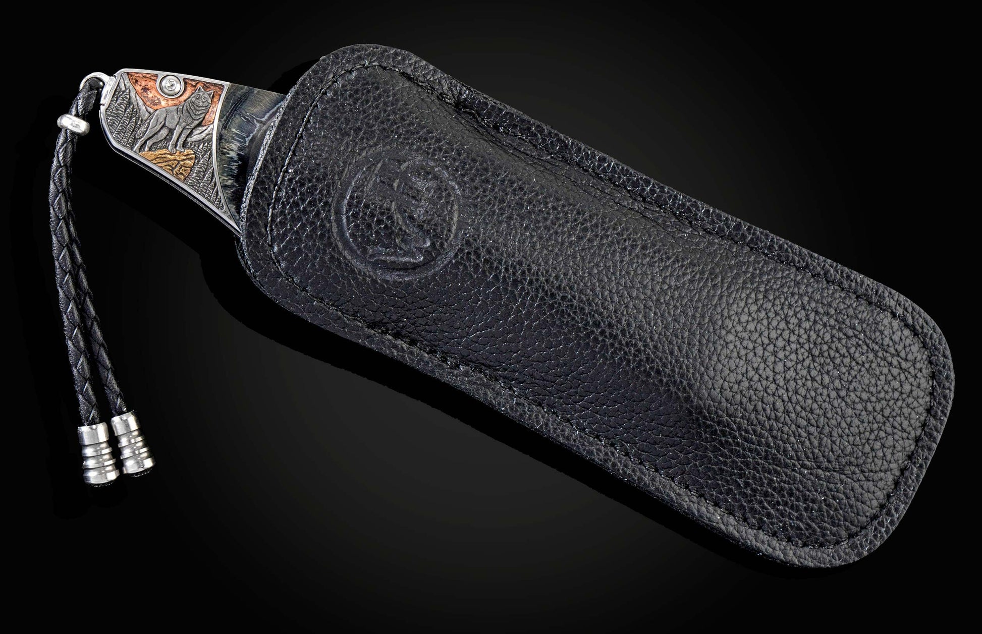  and a hand-forged Damascus steel blade by Zoe Crist