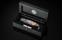  spinel gemstones and a  damascus steel blade by Luke Mattern