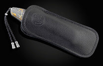  hand-forged with Gibeon Meteorite and set with spinel gemstones.