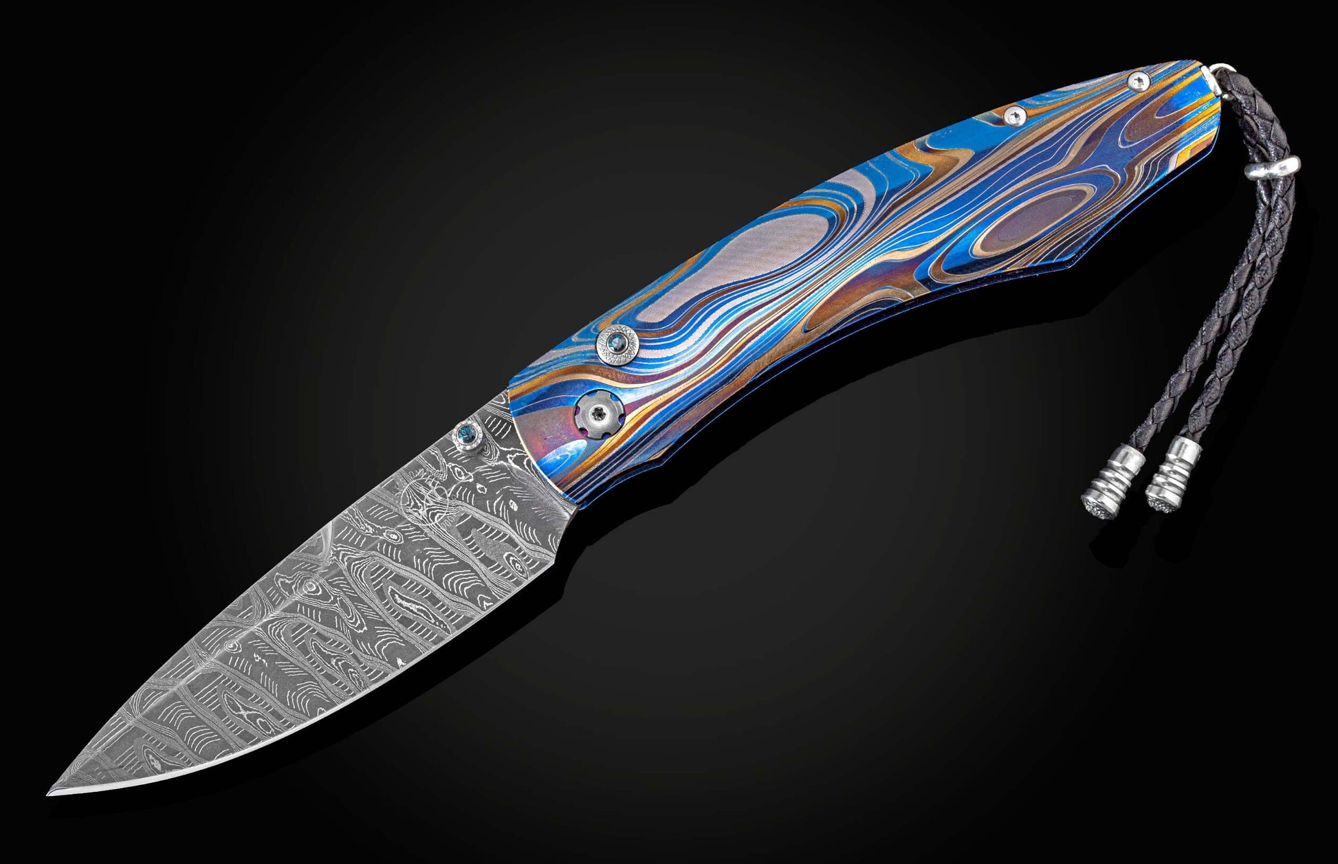  and a hand-forged damascus steel blade by Mike Norris