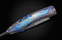 Custom knife from William Henry features a color laser-engraved titanium frame