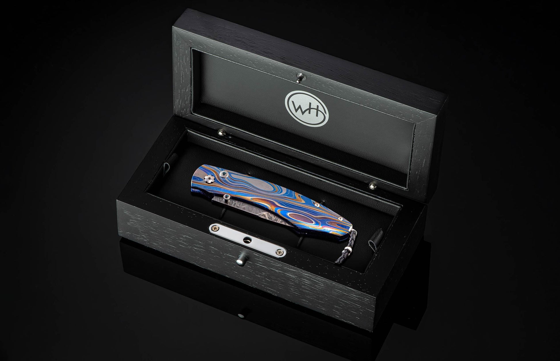 and a hand-forged damascus steel blade by Mike Norris