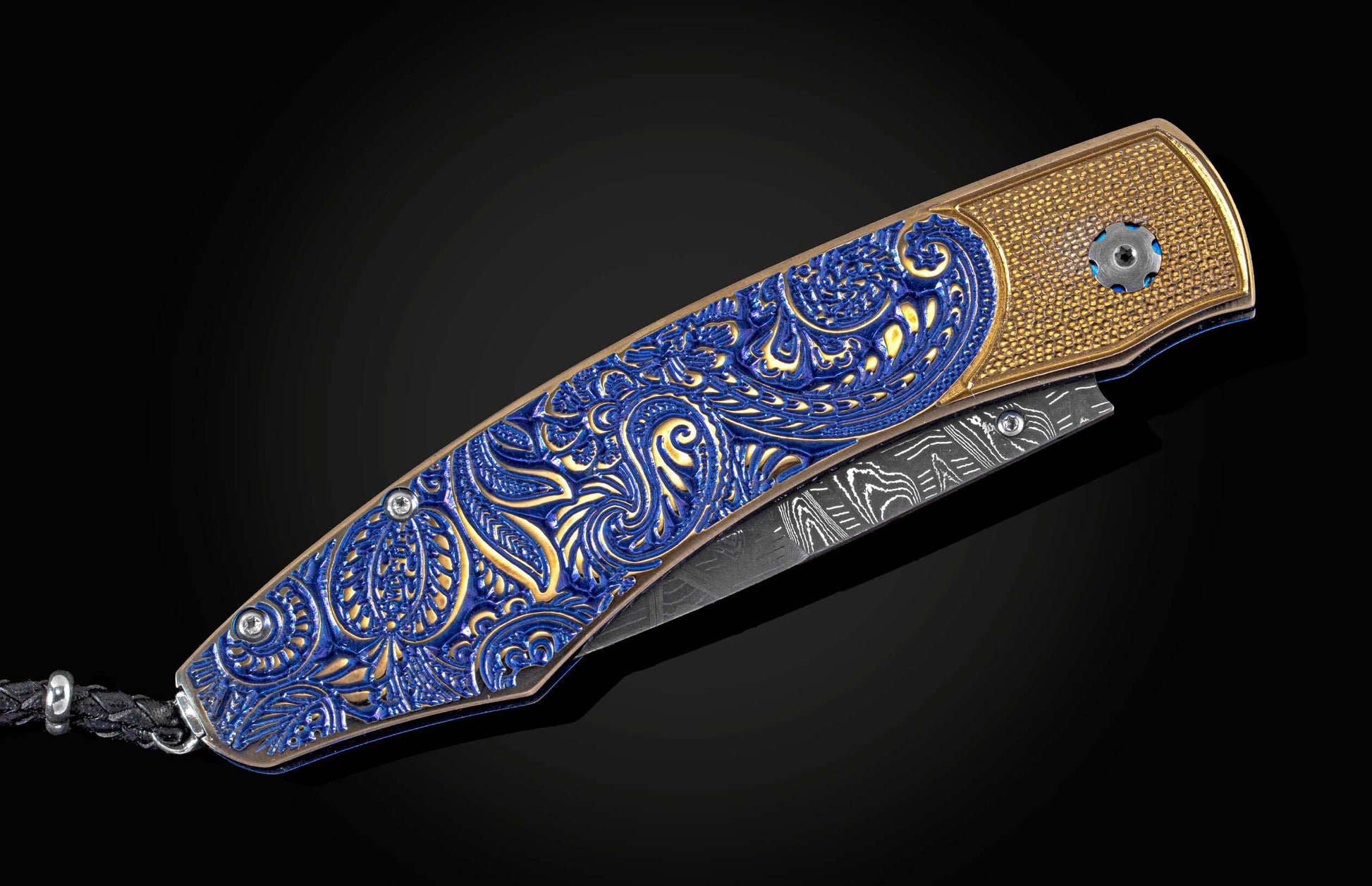 Handcrafted William Henry pocket knife featuring blue & gold anodized titanium handle with high detail micro machining