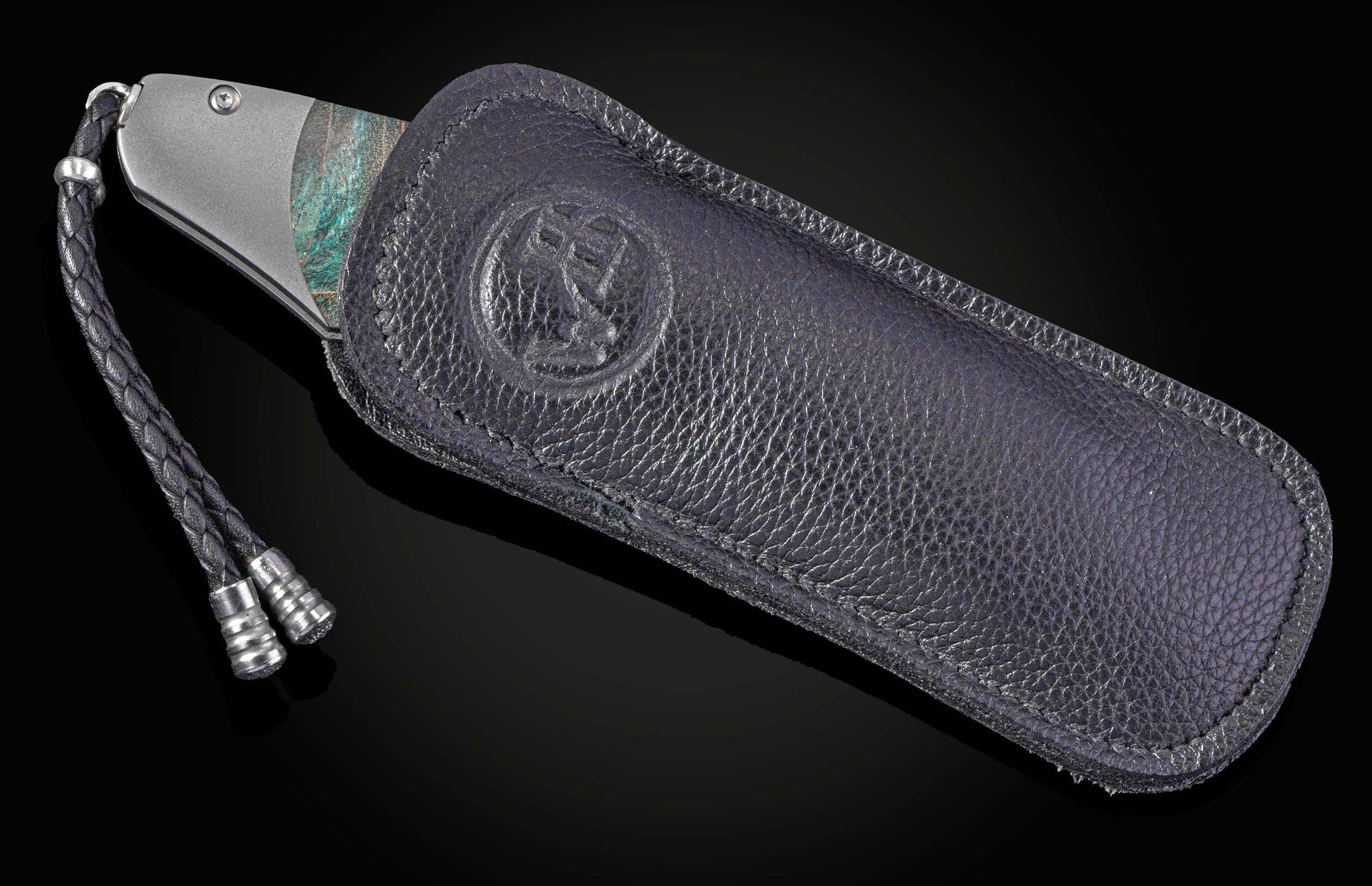 Handcrafted William Henry knife features a titanium frame
