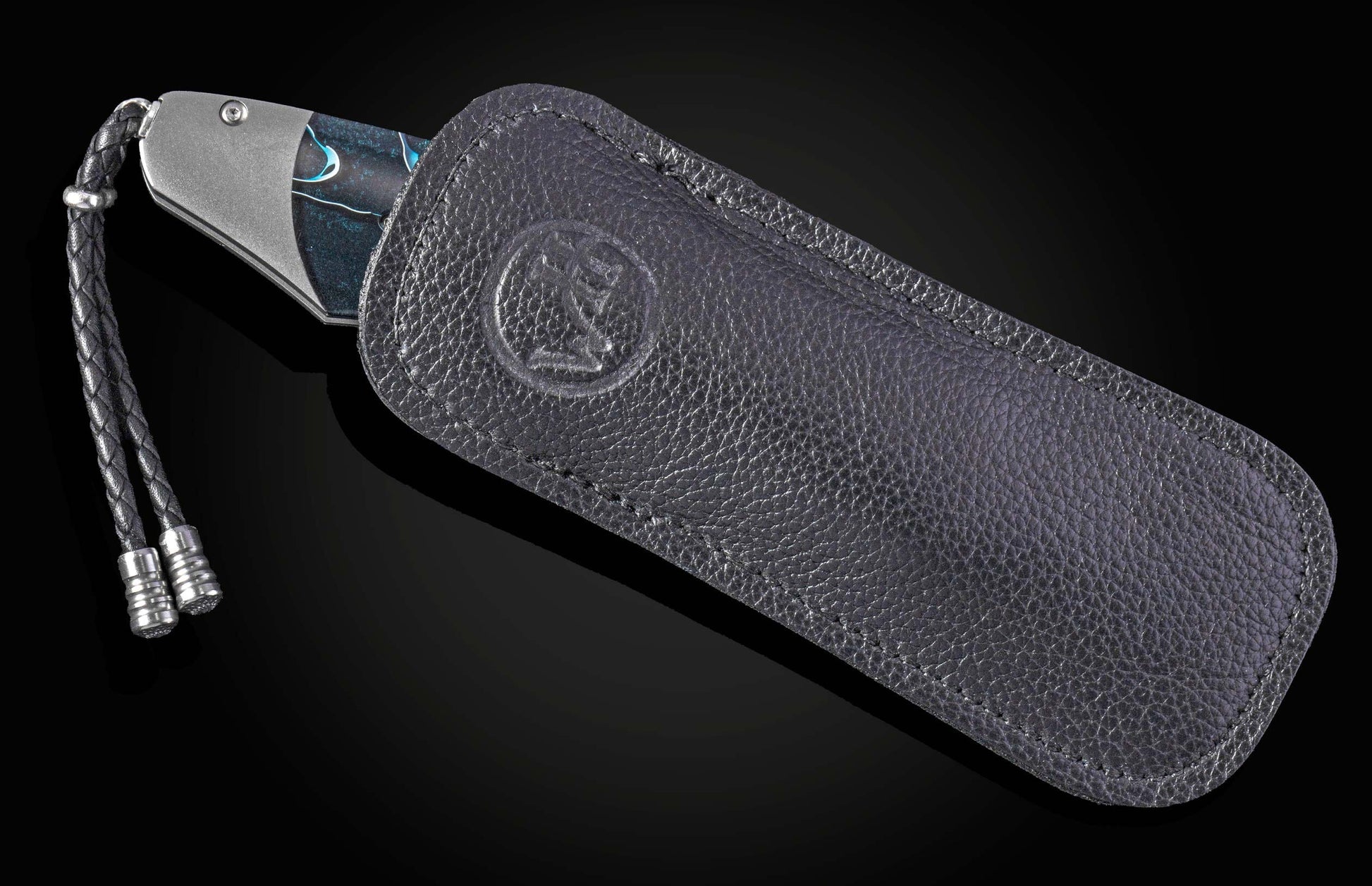 Handcrafted William Henry knife features a titanium frame