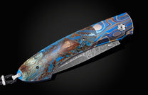  and a hand-forged damascus steel blade by Mike Norris