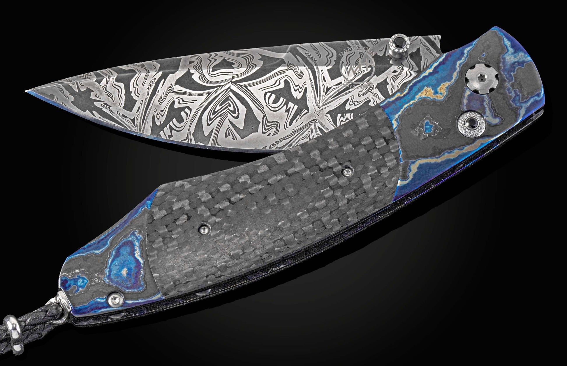 Custom William Henry knife with Moku-Ti frame, carbon fiber scales, and damascus blade