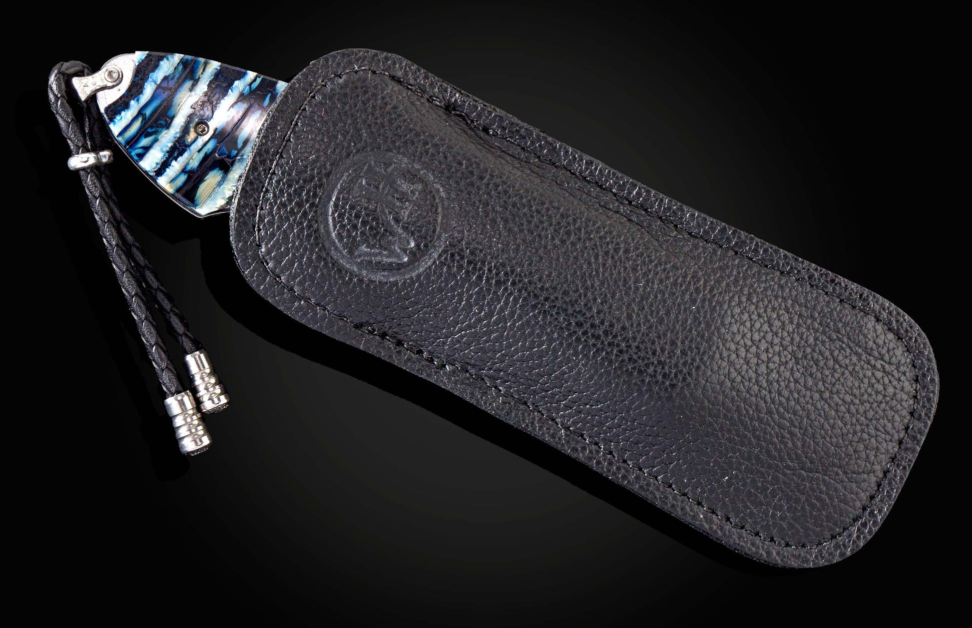  and a hand-forged damascus steel blade by Chad Nichols