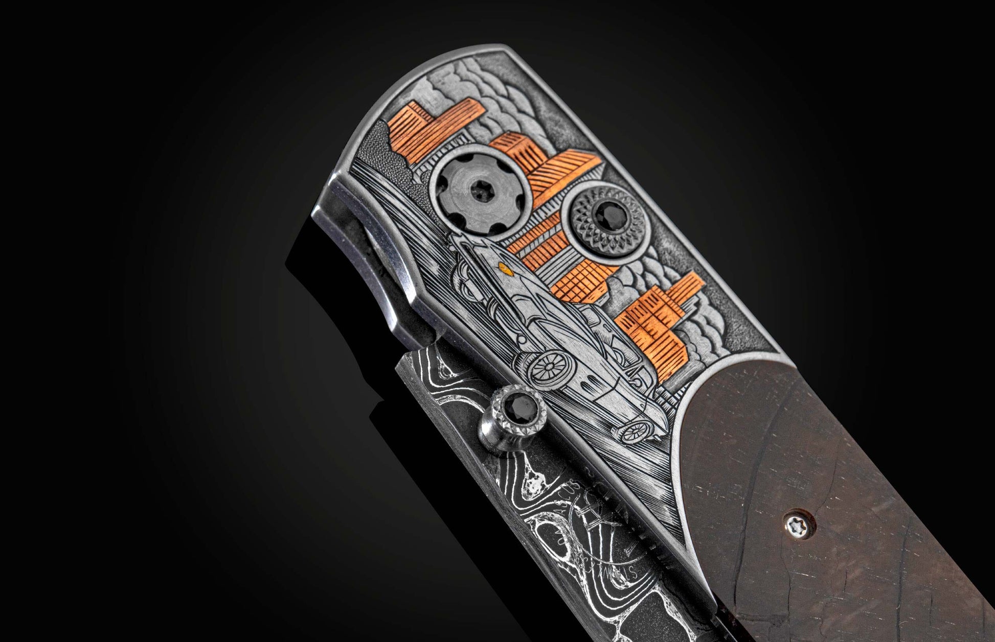 Handcrafted and hand-engraved knife from William Henry depicting a classic Corvette with 24K gold inlays by David He