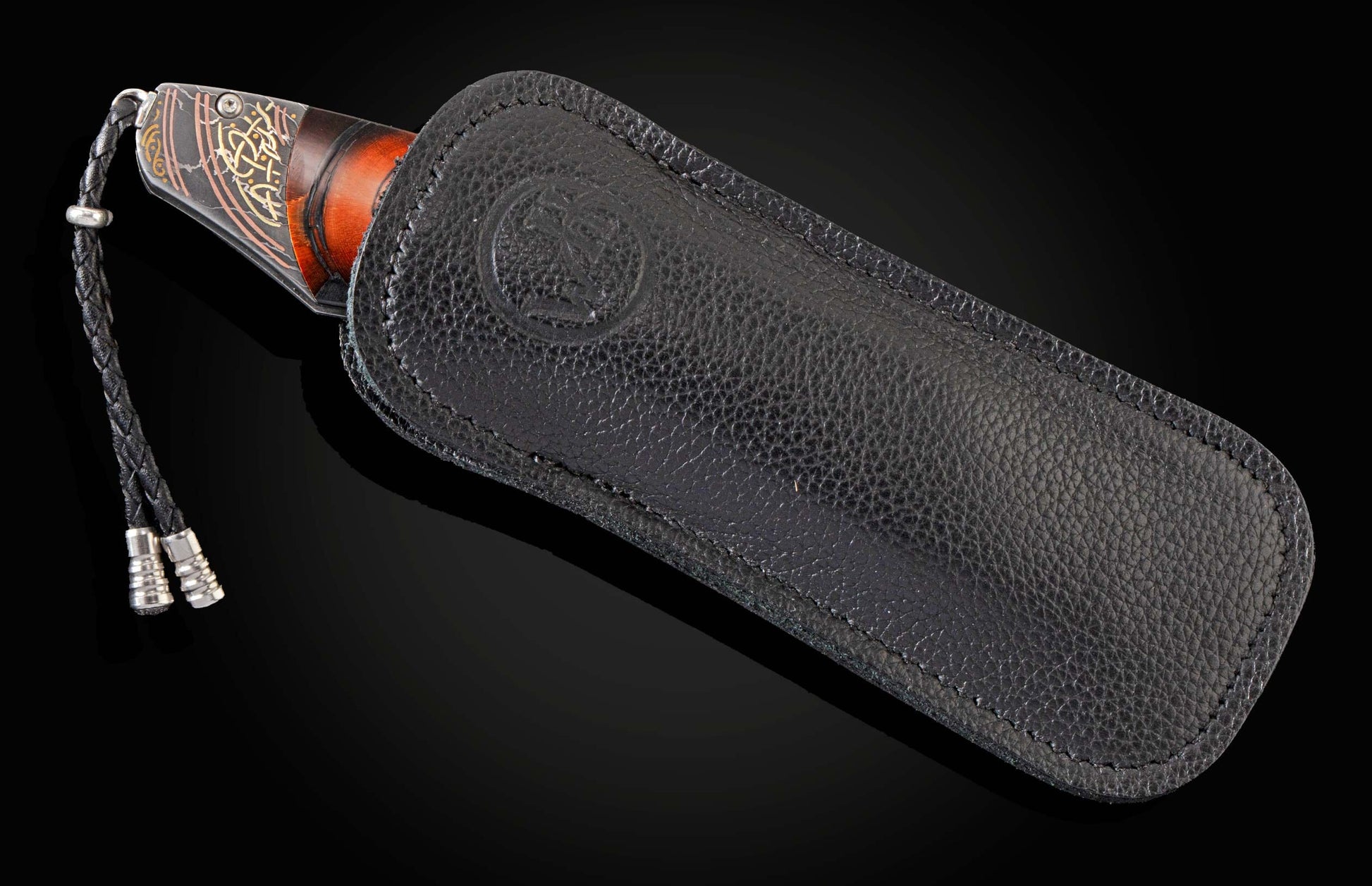  inlaid with fossil Woolly Mammoth tusk. The blade is hand-forged damascus steel
