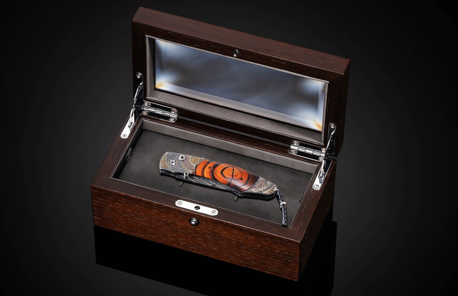 Handcrafted pocket knife from William Henry features hand-forged damascus