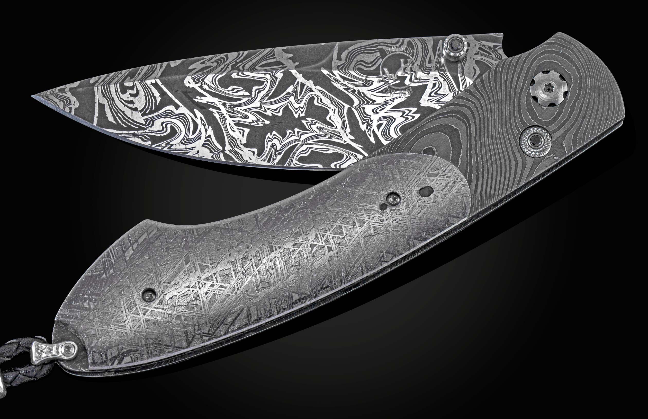 Handcrafted pocket knife from William Henry with a frame of hand-forged 'Twist' Damascus by Chad Nichols, inlaid with Gibeon meteorite scales, a hand forged Damascus steel blade by Luke Mattern, and set with black diamonds.