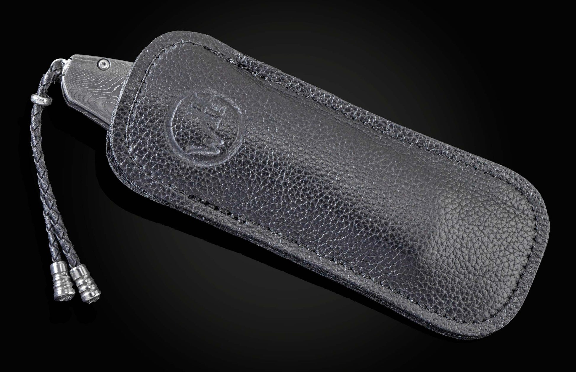 Handcrafted William Henry knife with hand forged Damascus frame by Chad Nichols