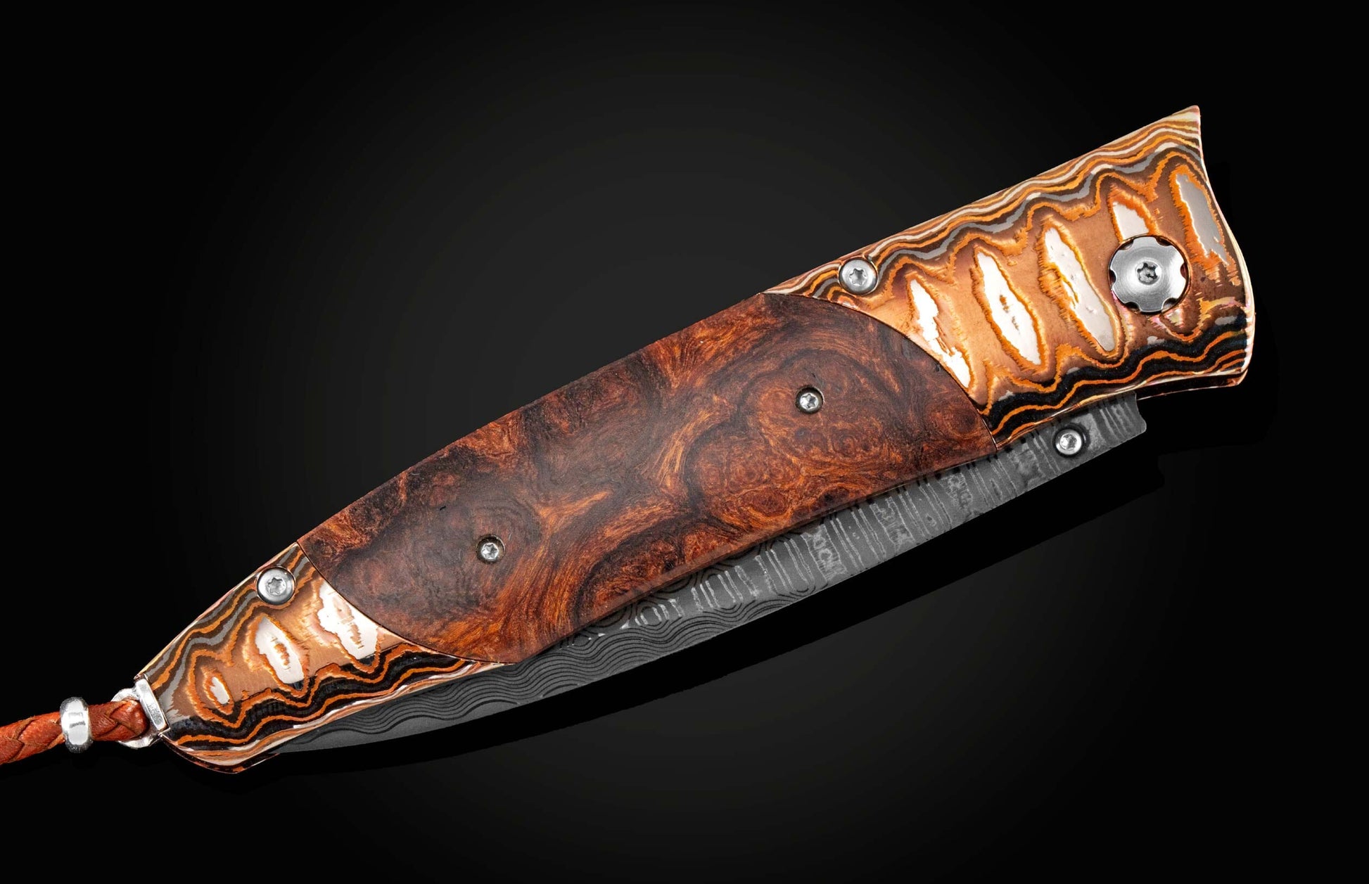  and a hand forged Damascus steel blade.