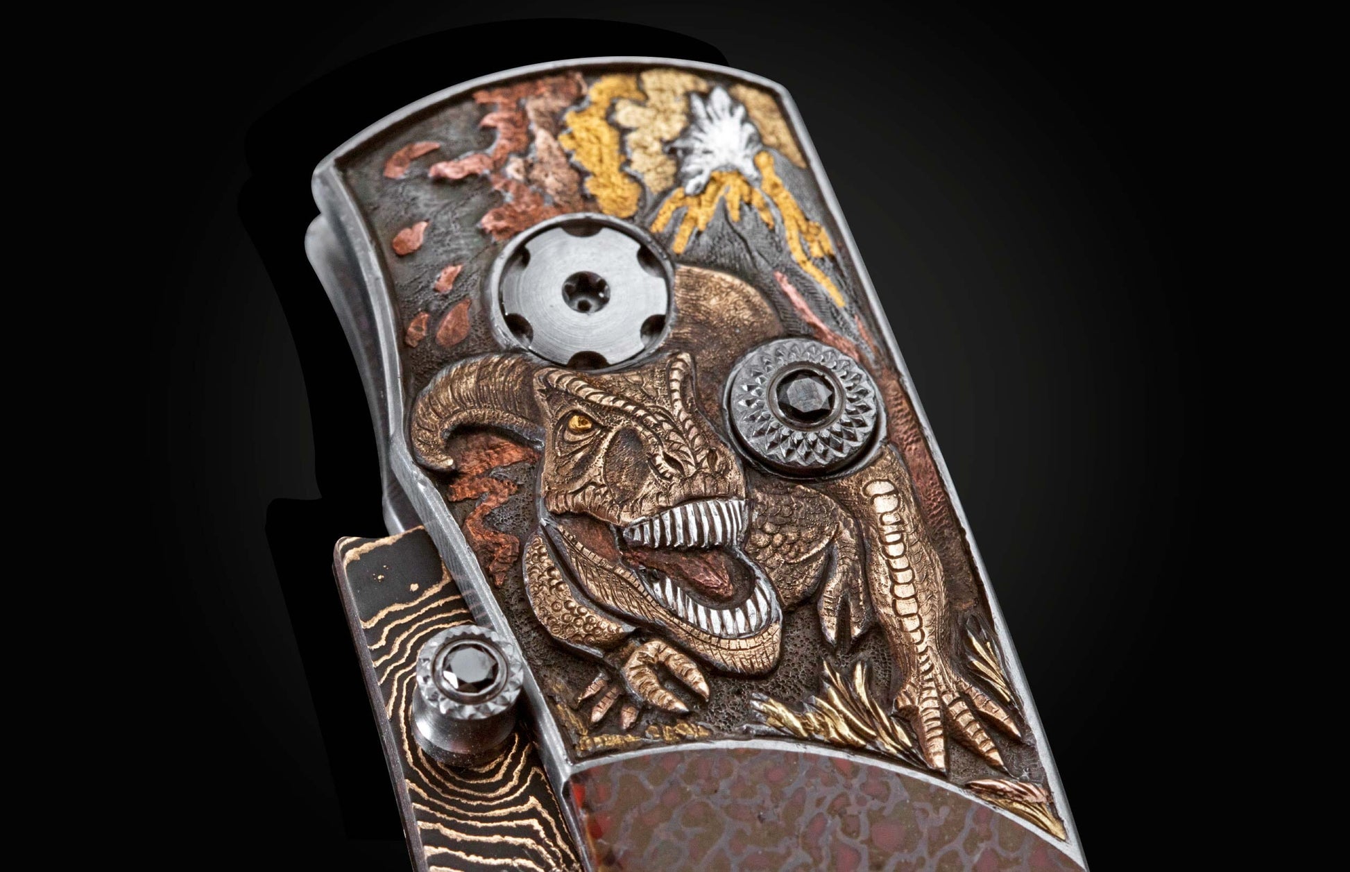  inlaid with fossil dinosaur bone and set with black diamonds. The blade is 'Bronze Mai' damascus steel.