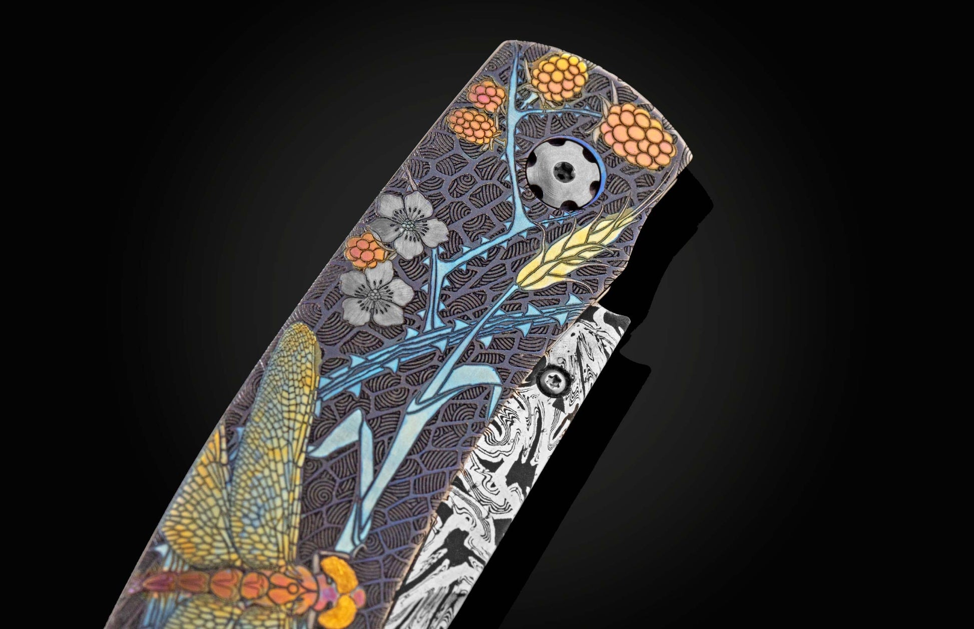Custom William Henry knife with anodized titanium frame with hand and laser engraving and 24K gold inlays by Tom Sterling