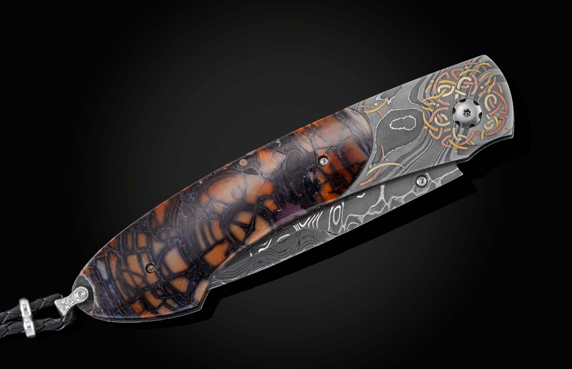  and copper inlays with spinel gemstones. The scales are made from ring-cut fossil Woolly Mammoth tusk. The blade is hand-