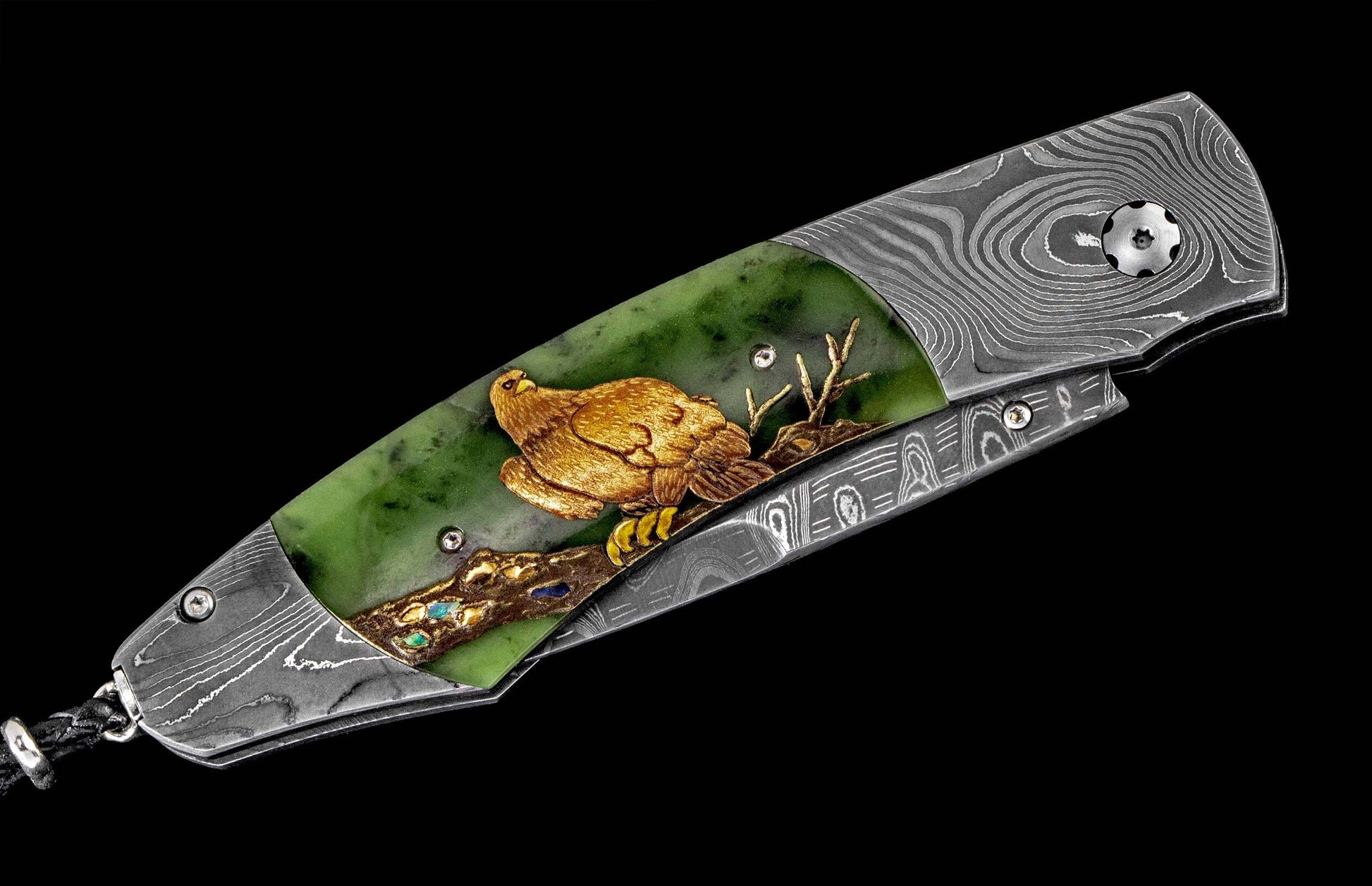 Ornate folding knife with a green jade handle, a golden sculpted eagle perched on an embellished branch, and patterned Damascus steel.