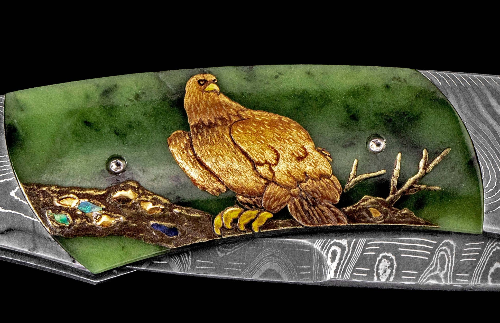 Knife with green jade handle featuring a golden eagle inlay, colorful gems, and a Damascus steel blade.