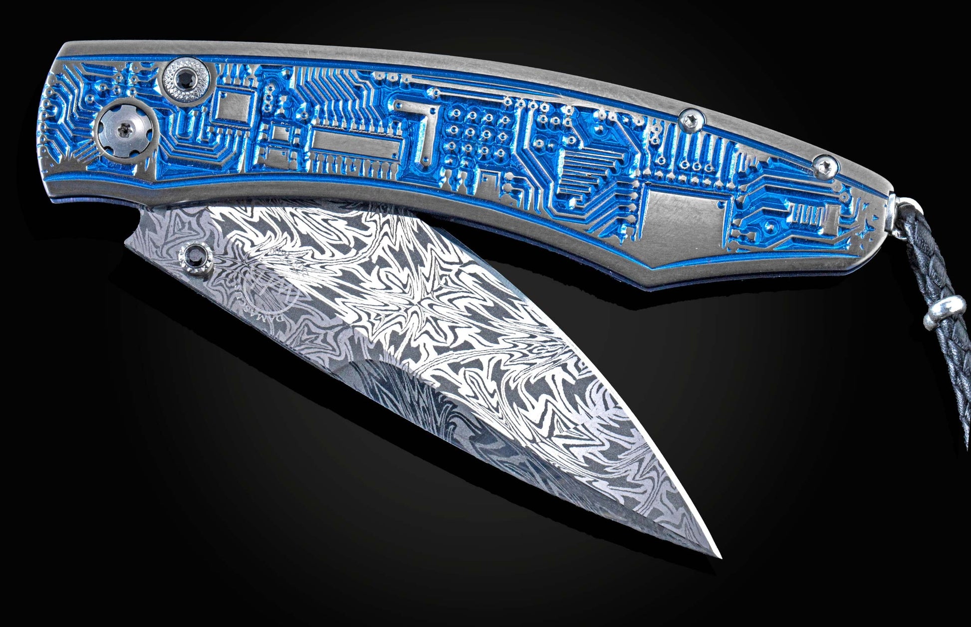 Custom knife from William Henry featuring an anodized titanium handle with high detail micro machining depicting circuitry, set with spinel gemstones, and a hand-forged damascus steel blade by Luke Mattern
