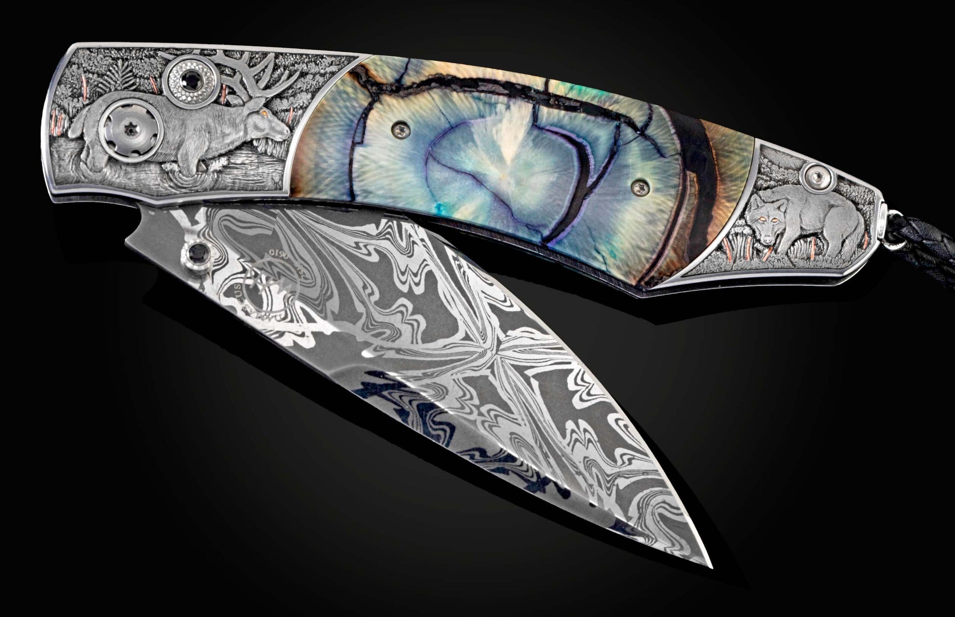 Custom William Henry knife with hand-engraved scenes of elk with copper and 24K gold inlays by Howard Thomas, fossil Woolly Mammoth tusk, spinel gem stones, and a hand-forged damascus steel blade by Luke Mattern