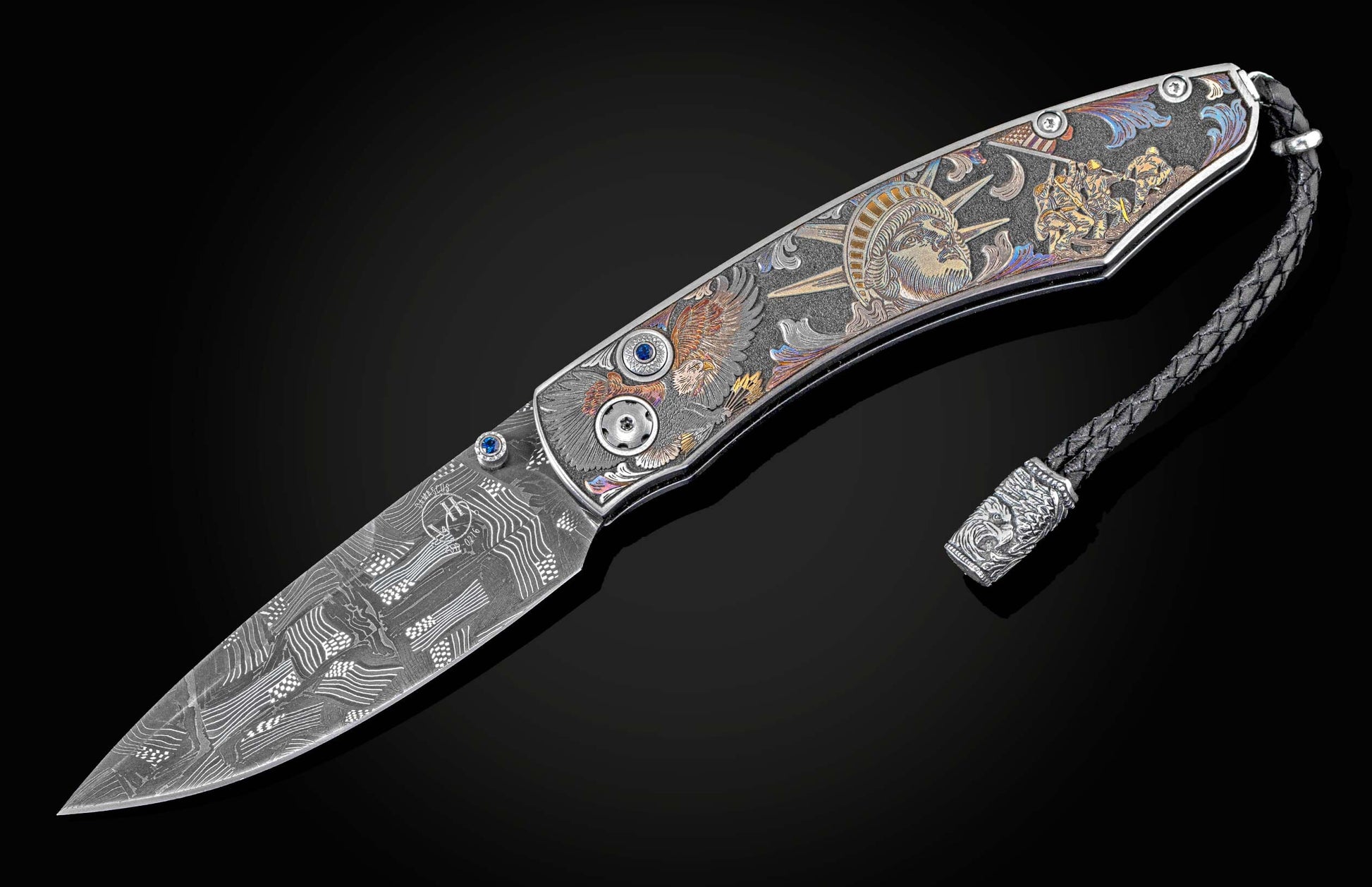  and a hand-forged damascus steel blade by Chad Nichols