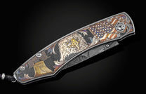 Handcrafted William Henry knife features color laser and hand-engraving work by Bottega Incisioni