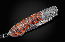  and  hand-forged bronze damascus blade by Baker Forge