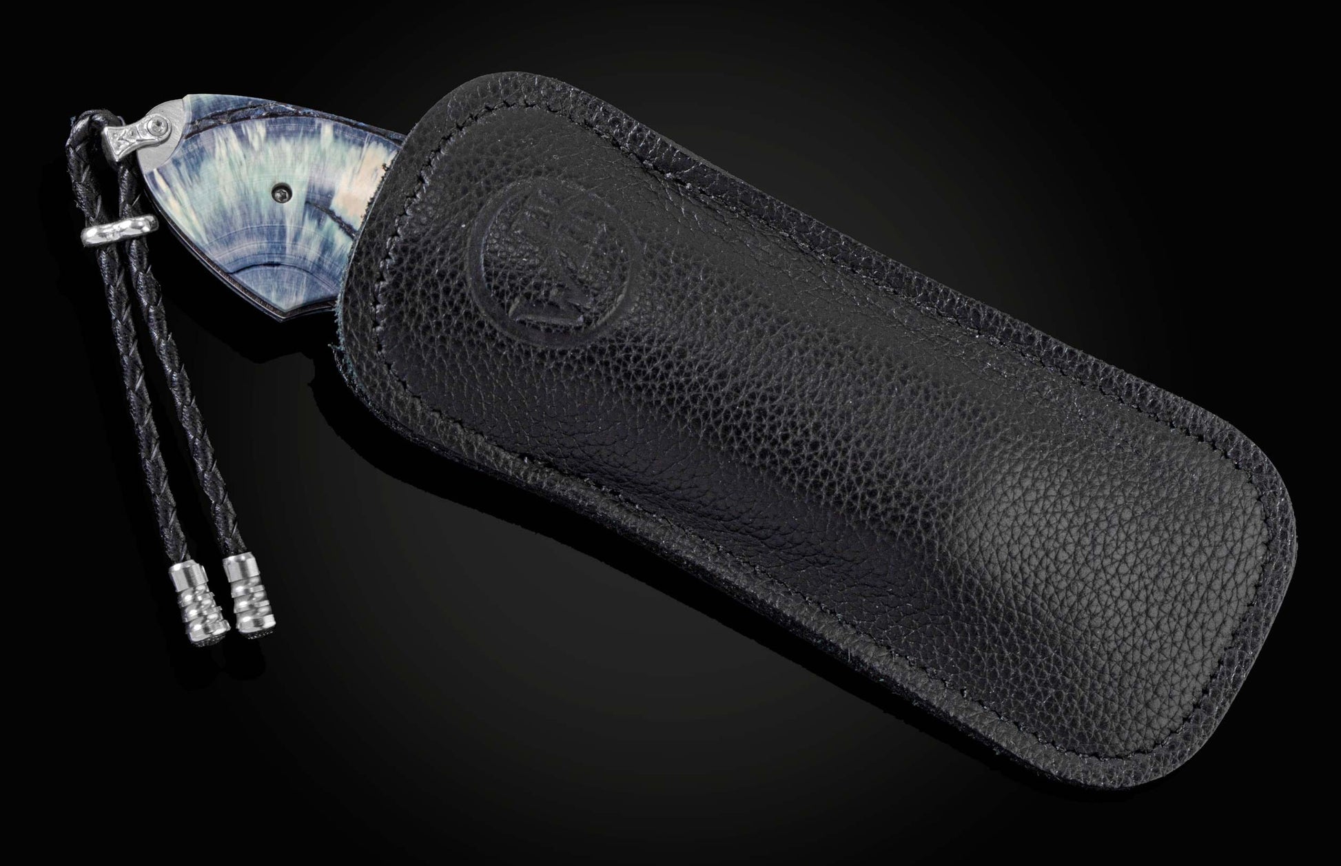 Handcrafted pocket knife from William Henry features a stainless steel frame