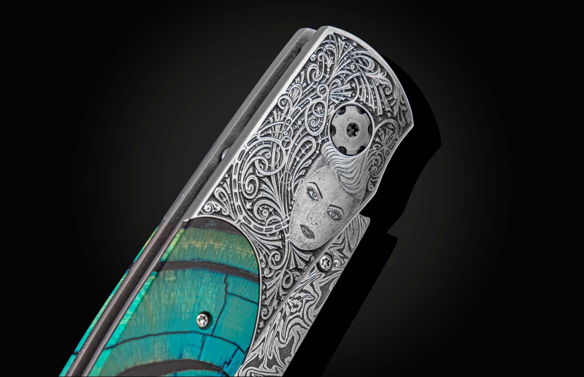 Handcrafted pocket knife from William Henry hand-engraved by Frederique Lepinois