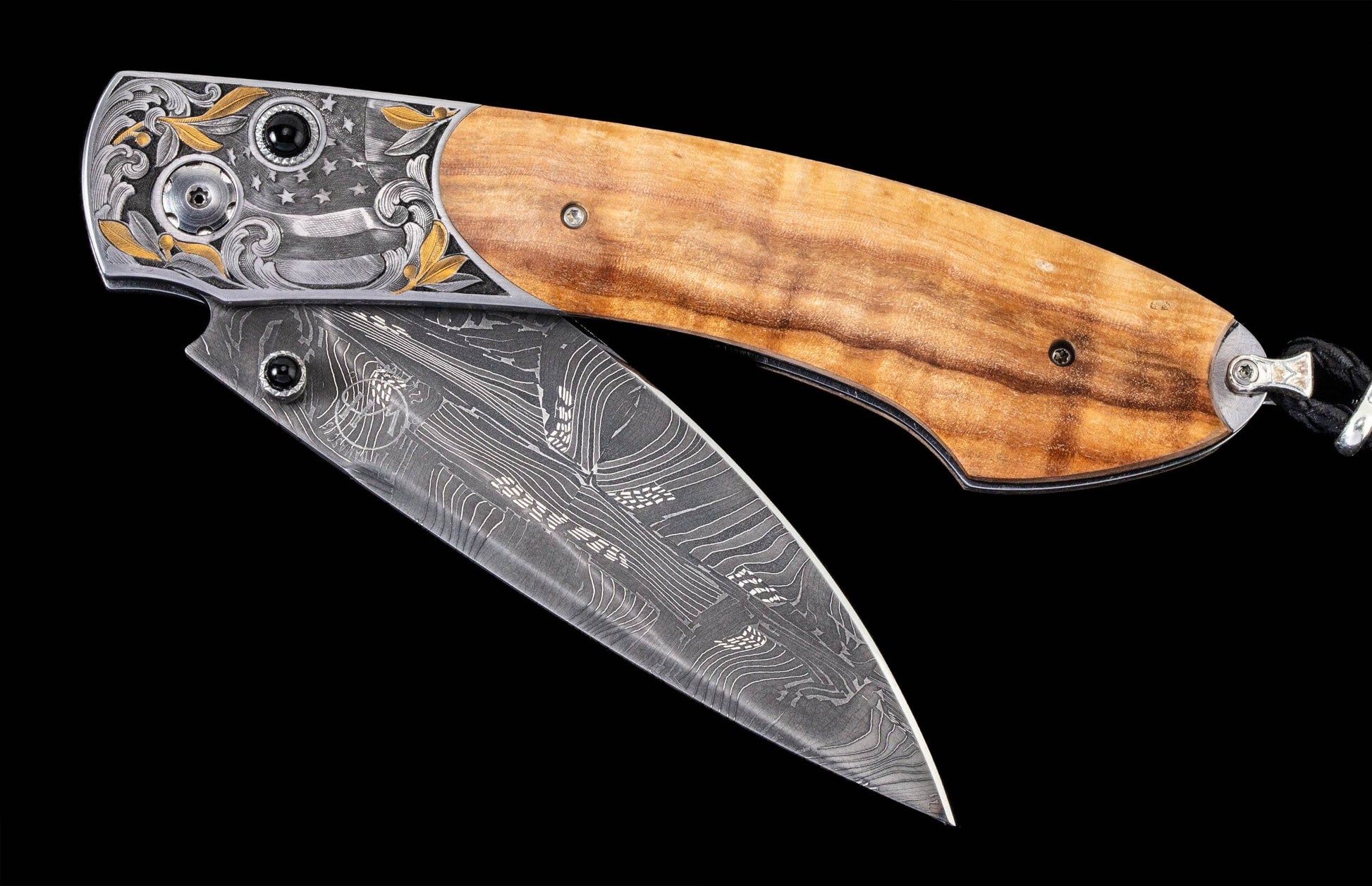 A Horse Chestnut and Black Onyx Pocket Knife 