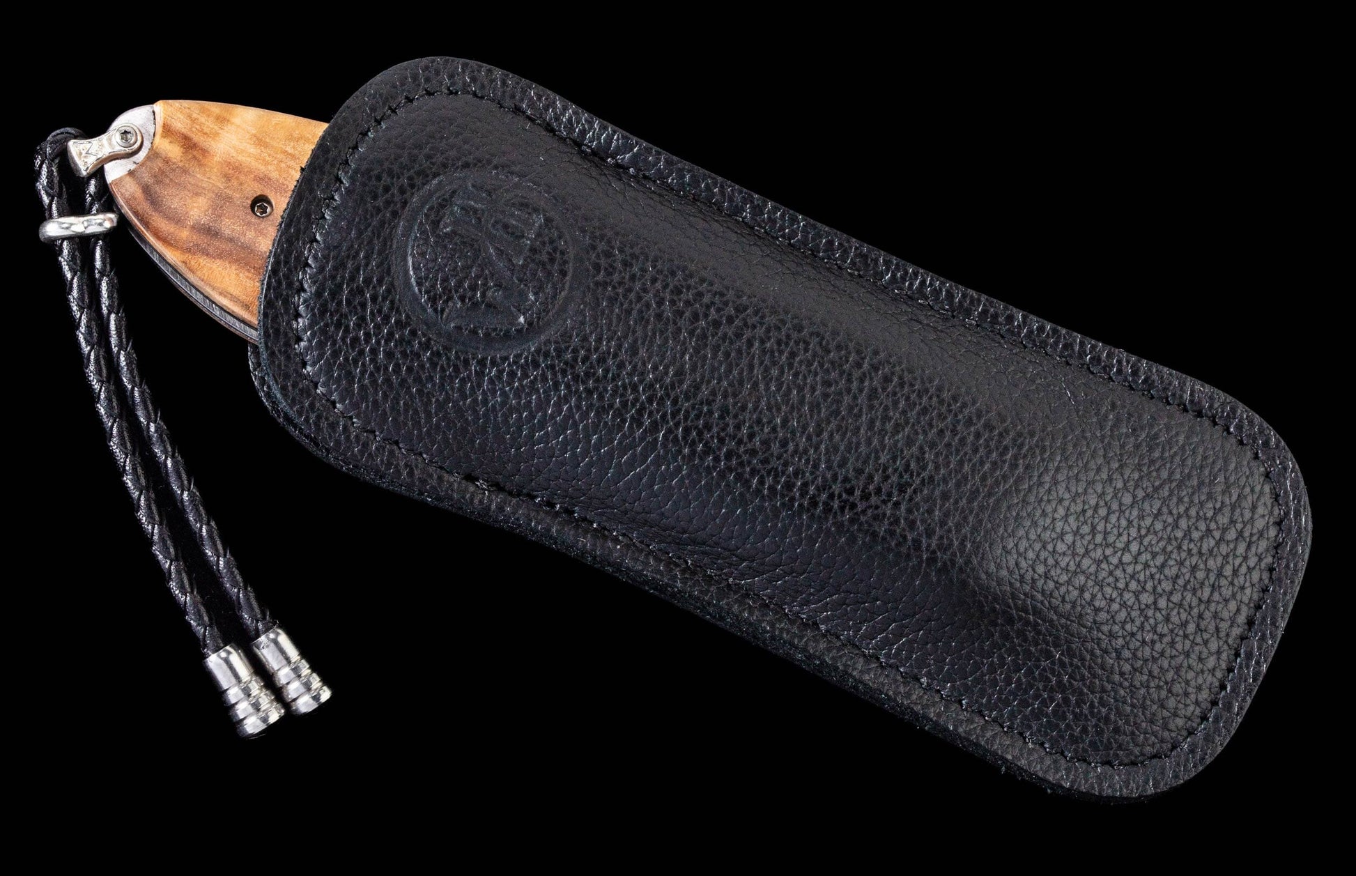 A Horse Chestnut and Black Onyx Pocket Knife in a leather case
