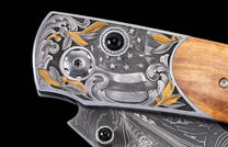 A Horse Chestnut and Black Onyx Pocket Knife 