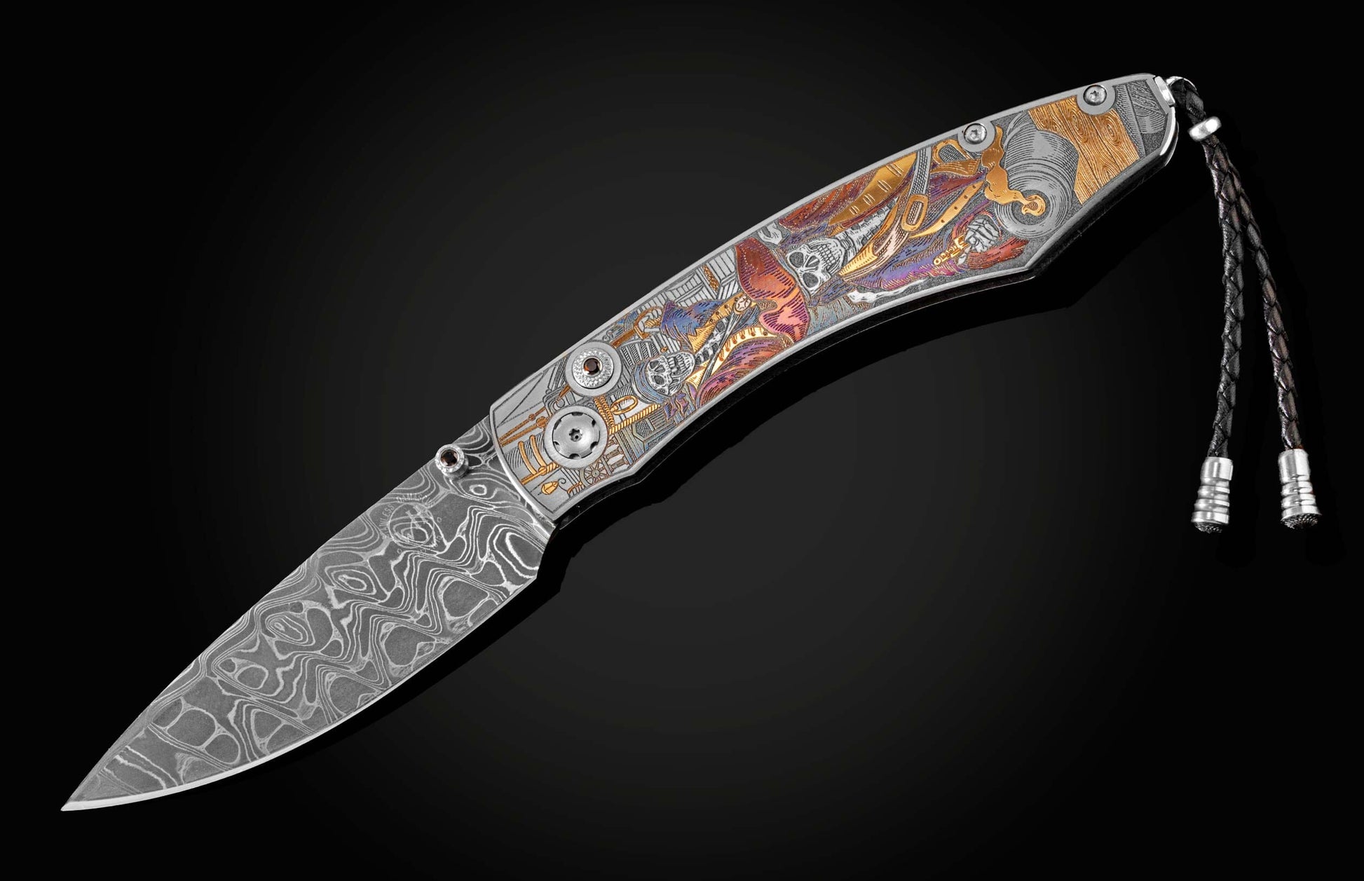 Handcrafted pocket knife from William Henry features beautiful color laser engraving of pirate scenes by Bottega Incisioni in Italy and set with spinel gemstones. The blade is damascus  steel.