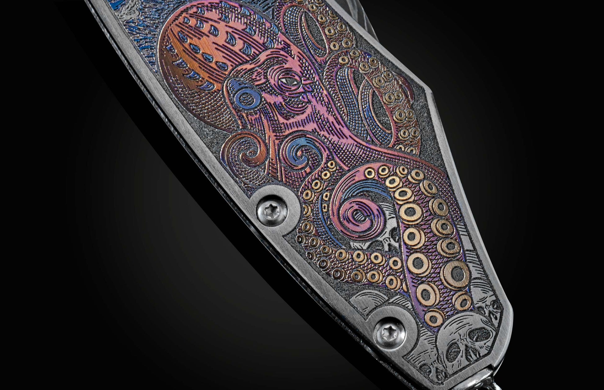 Handcrafted pocket knife from William Henry features beautiful color laser engraving of pirate scenes by Bottega Incisioni in Italy and set with spinel gemstones. The blade is damascus  steel.