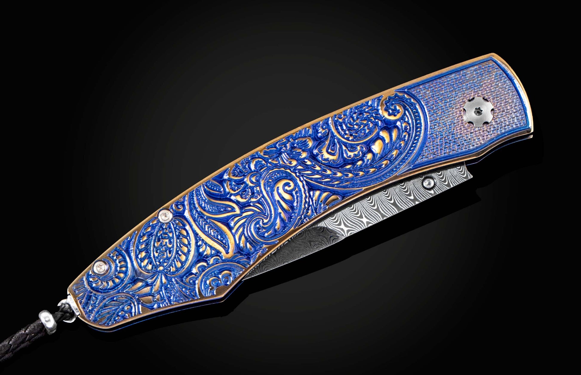  sapphires and a hand-forged damascus steel blade by Maximiliano Pescie.