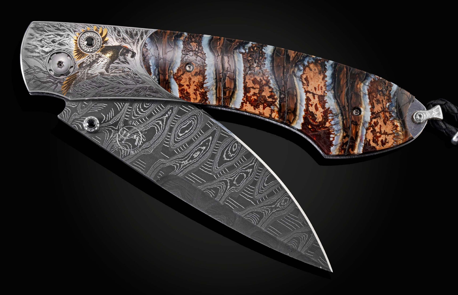 Handcrafted pocket knife from William Henry features a hand-engraved frame depicting a grouse and vegetation with 18K green gold, 24K yellow gold, copper, and sterling silver inlays, inlaid with a stunning piece of 10,000 year-old fossil Woolly Mammoth to
