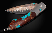 The Hot Lava pocketknife with turquoise, lava and bronze, and Copper Wave blade