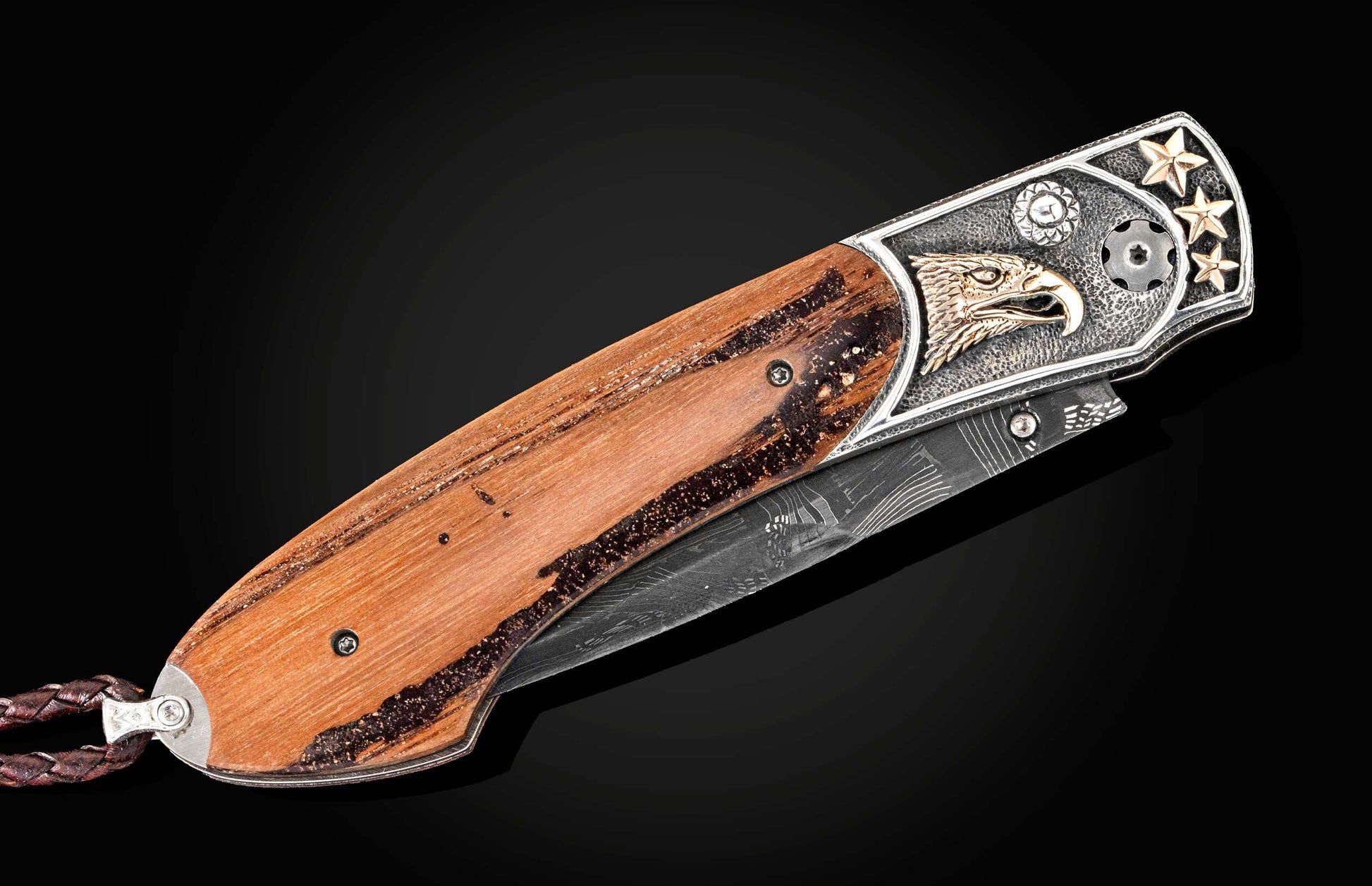  and a hand-forged damascus steel blade by Chad Nichols