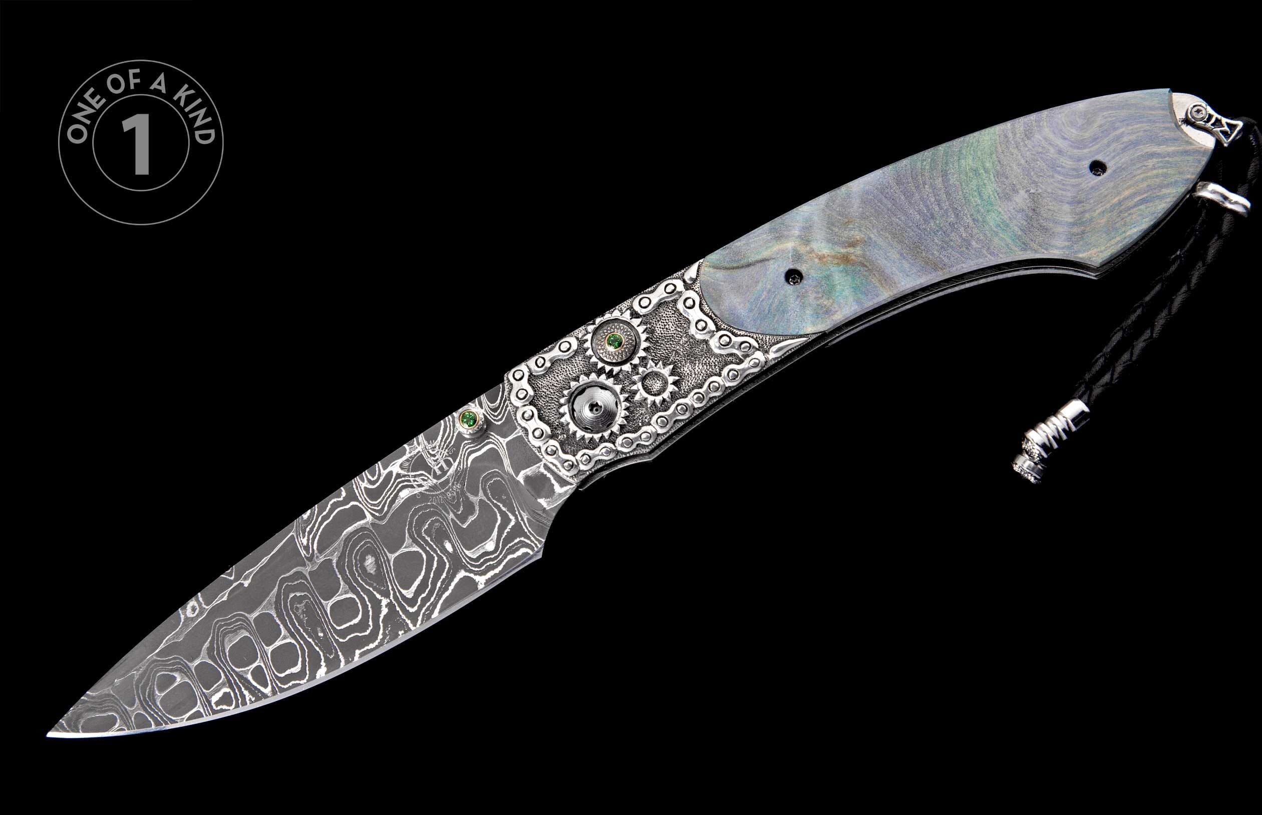 Ornate folding knife with iridescent mother-of-pearl handle, silver gear and chain link details with green gems, wavy Damascus blade, and black lanyard.
