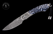 Knife with a wavy Damascus steel blade, intricate silver-toned gear and chain-link metalwork, black and white coral-patterned grip, and braided black lanyard.
