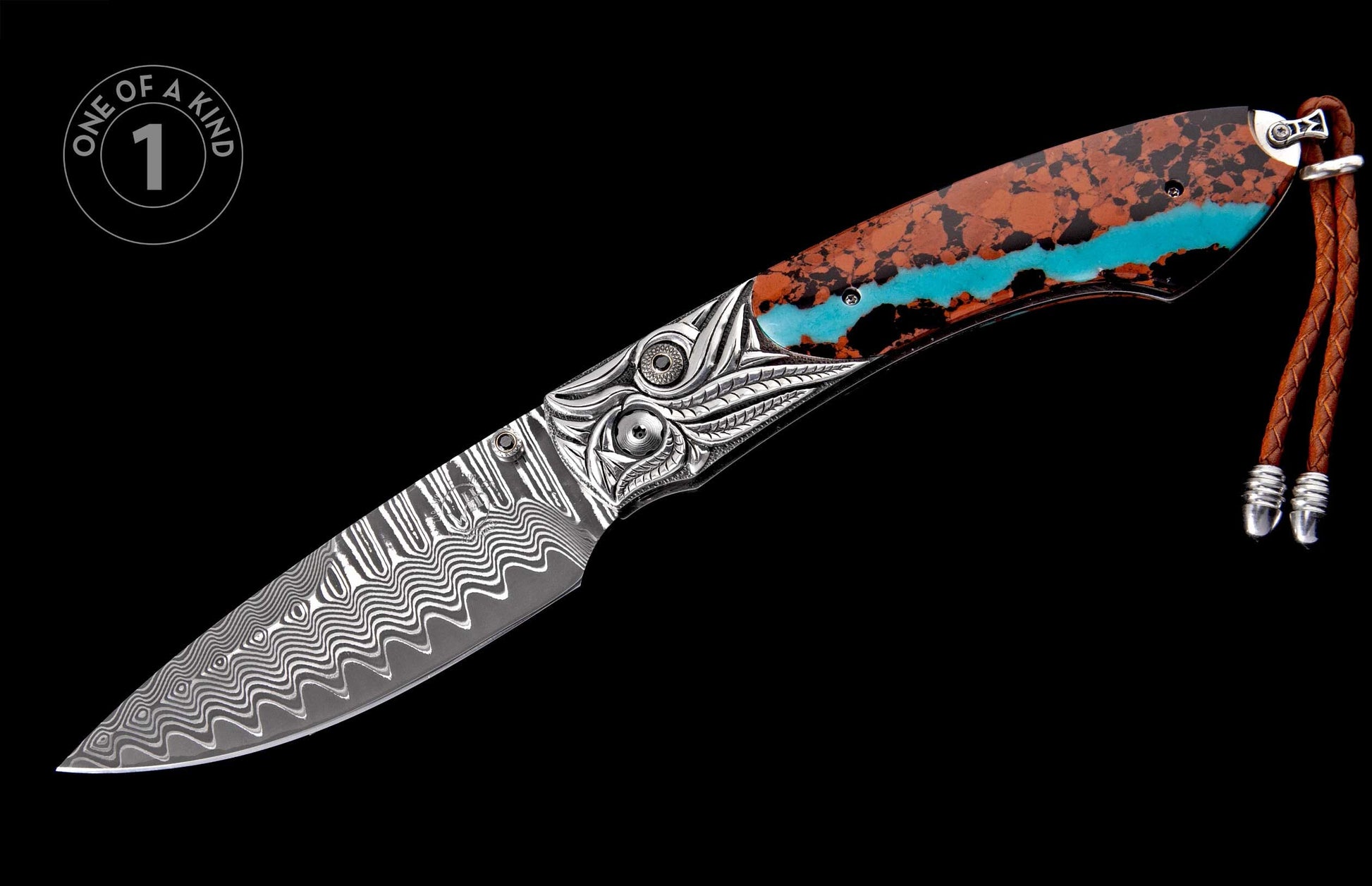 Damascus steel folding knife with an ornate silver bolster, a brown and black handle featuring a turquoise stripe, and a braided leather lanyard.