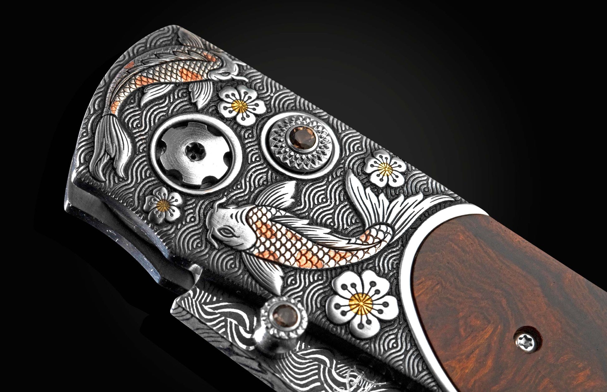 Handcrafted pocket knife from William Henry features hand and laser-engraved koi fish with copper and brass