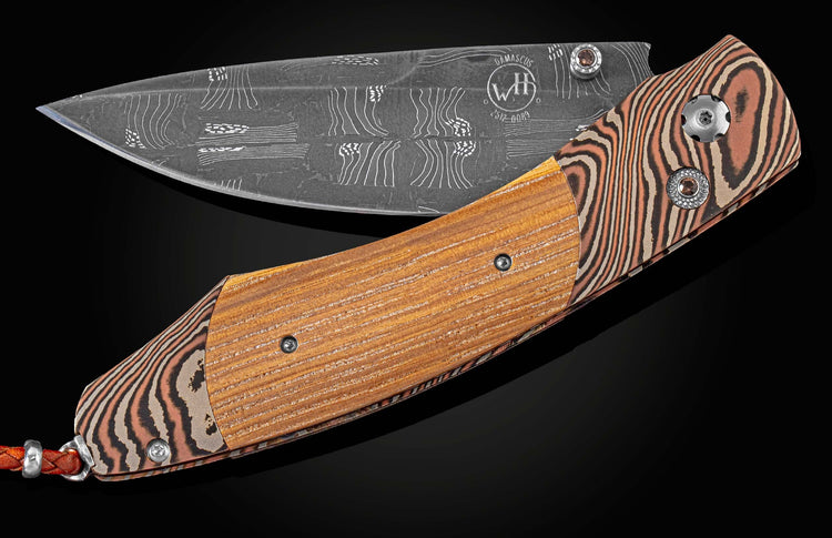 Handcrafted pocket knife from William Henry with a frame of hand-forged 'Twist' mokume by Mike Sakmar, inlaid with wood from the law office of Abraham Lincoln from 1843-1852, set with smoky quartz gemstones and a hand-forged 'Flag' damascus Steel blade.