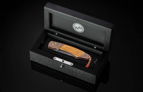  set with smoky quartz gemstones and a hand-forged 'Flag' damascus Steel blade.